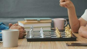 Pensioners pastime at senior home. Aged couple playing chess. Activities for seniors, elderly active lifestyle, older people time spending concept video