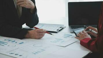 Team of business people working together in the meeting room office, teamwork background charts and graphs banner, double exposure successful teamwork,business planning concept. video