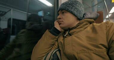 Timelapse of train passenger looking out the window during evening ride video