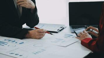 Team of business people working together in the meeting room office, teamwork background charts and graphs banner, double exposure successful teamwork,business planning concept. video