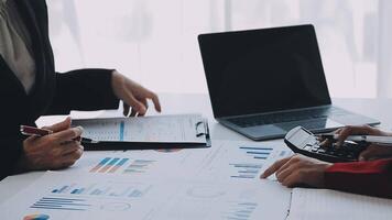 Team of business people working together in the meeting room office, teamwork background charts and graphs banner, double exposure successful teamwork,business planning concept. video