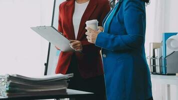 Team of business people working together in the meeting room office, teamwork background charts and graphs banner, double exposure successful teamwork,business planning concept. video
