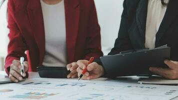 Team of business people working together in the meeting room office, teamwork background charts and graphs banner, double exposure successful teamwork,business planning concept. video