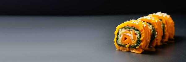 Close up of artful pumpkin sushi roll preparation isolated on a gradient background photo