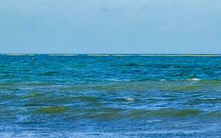 Tropical mexican beach clear turquoise water Playa del Carmen Mexico. photo