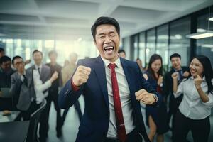 Happy Successful Asian Businessman Celebrating in Modern Office, Celebrate Success and Achieving Goals, Male Entrepreneur Celebrate Winning Moments. photo