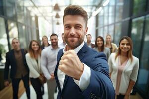 Confident Businessman Showing a Fighting Pose, Handsome Manager Gestures Raising Fists in Modern Office, Male Entrepreneur Fights a Problem photo