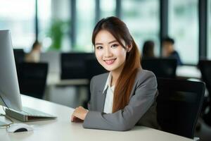 Beautiful Asian Businesswoman Working with Computer, Female Manager Works in Modern Office, Analysis Data Statistics and Business Planning. photo