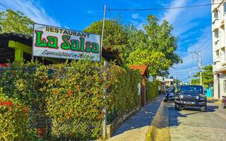 Puerto Escondido Oaxaca Mexico 2023 Typical beautiful colorful tourist street sidewalk city Puerto Escondido Mexico. photo