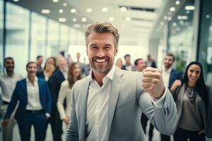 Confident Businessman Showing a Fighting Pose, Handsome Manager Gestures Raising Fists in Modern Office, Male Entrepreneur Fights a Problem photo