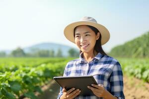 Portrait of Female Farmer Using Tablet in the Farm, Observes and Check Growth Plants, Agriculture Smart Farming Concept photo