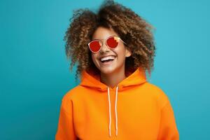 Portrait of Cheerful Woman Wears Sport Fashion, Happy Sporty Female Smiling on Studio Background, Winner Gesture Celebrating. photo