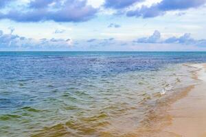 Tropical mexican beach clear turquoise water Playa del Carmen Mexico. photo