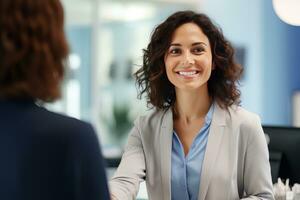 Portrait of Smiling Receptionist Female Greeting Client, Happy Business Woman Reception in Modern Office photo