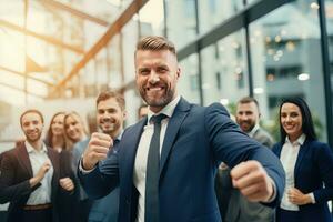 Confident Businessman Showing a Fighting Pose, Handsome Manager Gestures Raising Fists in Modern Office, Male Entrepreneur Fights a Problem photo