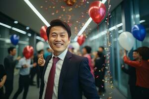 Happy Successful Asian Businessman Celebrating in Modern Office, Celebrate Success and Achieving Goals, Male Entrepreneur Celebrate Winning Moments. photo