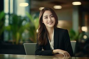 Portrait of a Beautiful Businesswoman in Modern Office, Asian Manager Looking at Camera and Smiling, Confident Female CEO Planning and Managing Company. photo