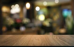 Empty wooden table in front of abstract blurred background of coffee shop . can be used for display or montage your products.Mock up for display of product photo