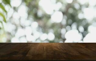 Wood Table Top in Blur Background room interior with empty copy space. photo