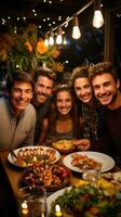 Multi-generational family enjoying potluck dinner photo