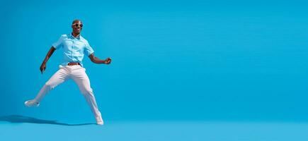 Dancing man on summer vacation, active, wearing shirt, pants, shoes, sunglasses, isolated on a blue background.text copyspace banner background Ai Generated photo