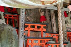 The Shrine of the Thousand Torii Gates. Fushimi Inari Shrine. It is famous for its thousands of vermilion torii gates. Japan photo