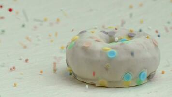 Glazed donut with sugar sprinkles video