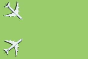 Model plane,airplane on green color background. photo