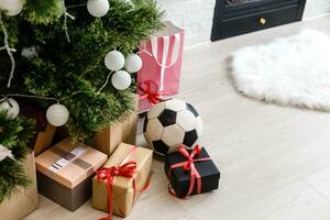 soccer ball near christmas tree photo