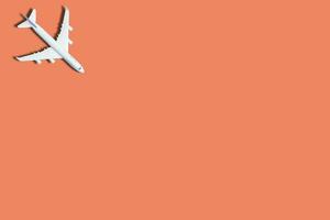 airplane figure on pink background photo