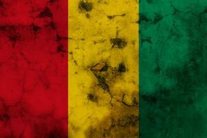 Old grunge flag of Guinea photo