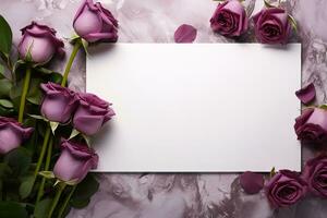 mockup white blank paper sheet with purple roses flowers top view on a marble background, floral template empty card flat lay for design with copy space photo