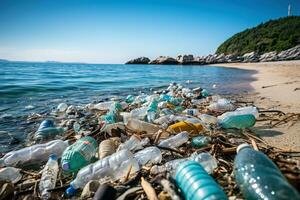 Empty used plastic bottle on the beach by the sea, Environmental pollution photo