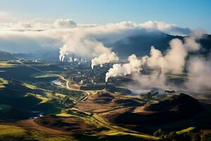 Geothermal power station nestled amidst misty volcanic landscapes harvesting earths heat photo