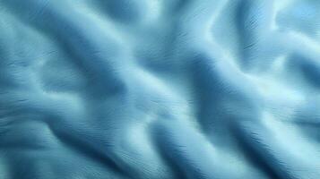 Light blue soft plush wrinkled fabric textured background photo