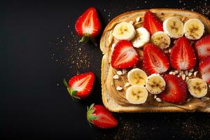 sweet toast with peanut butter strawberries banana on black background top view photo