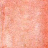 Peach-scarlet watercolor texture with spots, dots, blurred circles photo