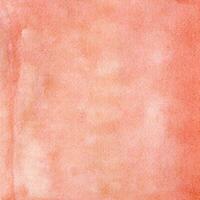 Peach-scarlet watercolor texture with spots, dots, blurred circles photo