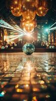 Dance floor shines with disco ball photo