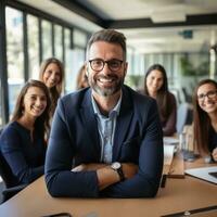 CEO with team sitting at conference table photo