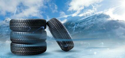 four black tires Winter tire in snowfall photo
