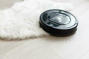 robotic vacuum cleaner on the floor photo