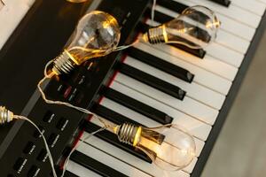 Synthesizer, piano, piano keys close-up, blurred background, colorful bokeh, musical instruments, new year, Christmas, Christmas concert photo