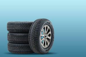 winter tyre cover on Lights on blue and snow background photo