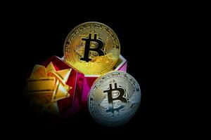 Coin bitcoin in a gift box for a ring or jewelry the concept of crypto currency the best gift photo