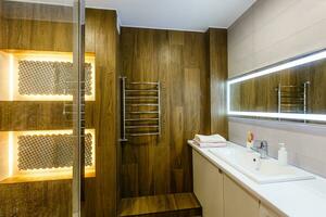 Brown bathroom including bath and sink, 3d render photo