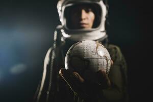 Man posing dressed as an astronaut in skyrocket elevator photo