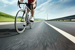 Healthy man riding bike on the road photo