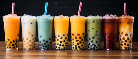 Assortment of fresh boba on black background photo