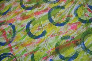 Circle painting messy surface background,  rusty background grungy multicolored photo